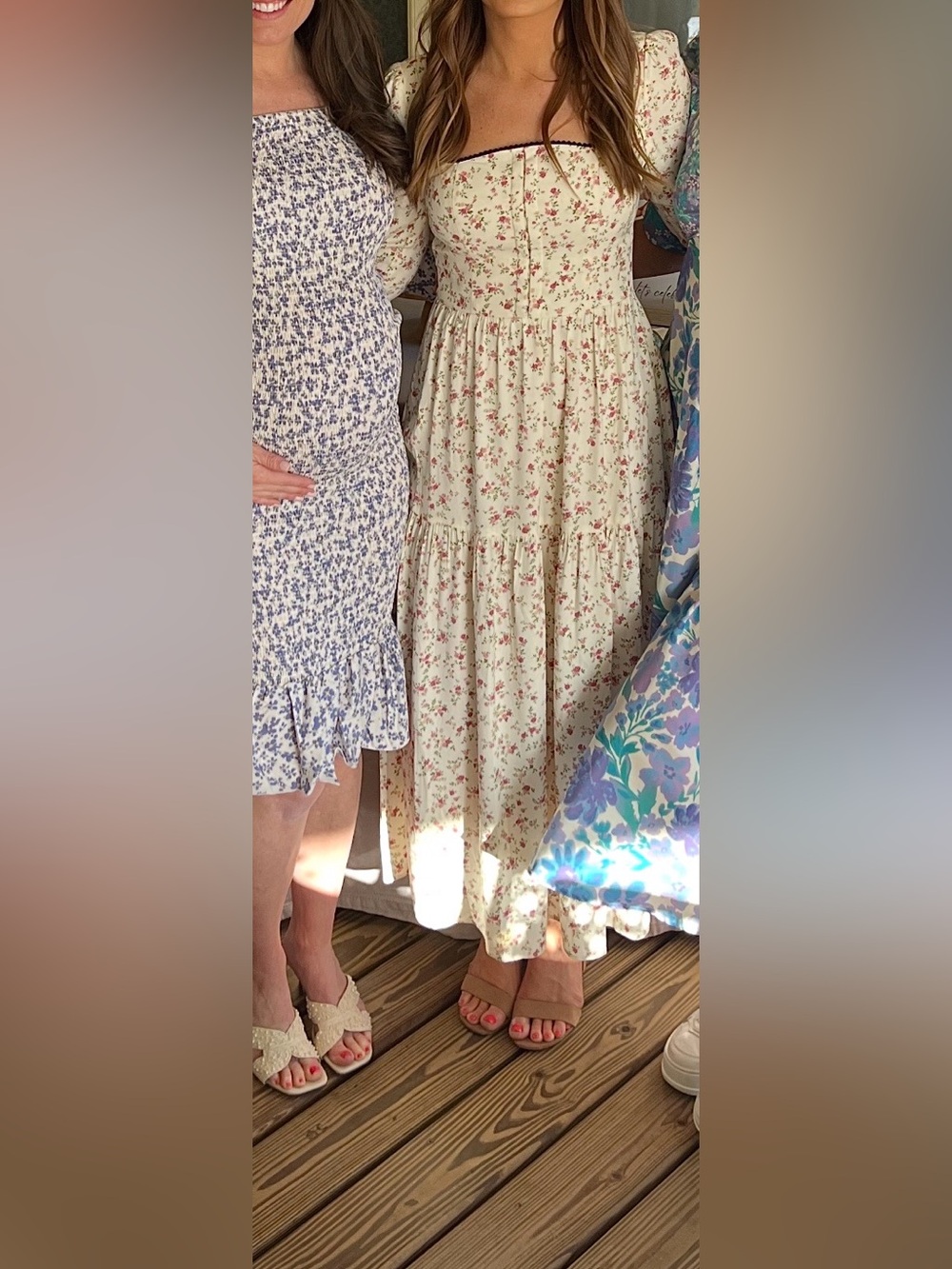 Reformation floral dress with black trim